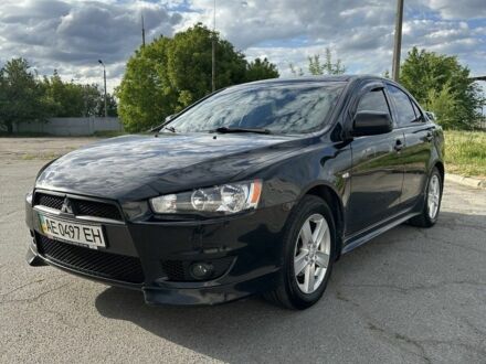 Чорний Міцубісі Lancer, об'ємом двигуна 2 л та пробігом 292 тис. км за 7500 $, фото 1 на Automoto.ua