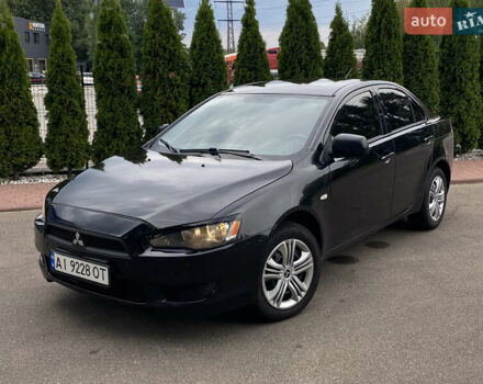 Чорний Міцубісі Lancer, об'ємом двигуна 1.5 л та пробігом 203 тис. км за 5990 $, фото 1 на Automoto.ua