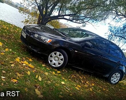 Чорний Міцубісі Lancer, об'ємом двигуна 1.5 л та пробігом 261 тис. км за 7000 $, фото 1 на Automoto.ua