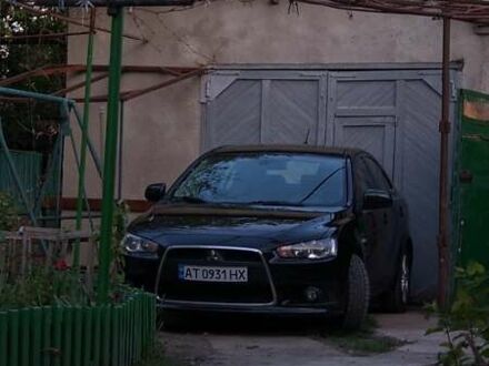 Черный Мицубиси Лансер, объемом двигателя 1.8 л и пробегом 210 тыс. км за 7300 $, фото 1 на Automoto.ua