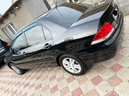 Мицубиси Лансер 2011 в Одессе на Automoto.ua Черный Мицубиси Лансер, объемом двигателя 1.6 л и пробегом 129 тыс. км за 5700 $, фото 1 на Automoto.ua