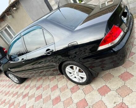 Чорний Міцубісі Lancer, об'ємом двигуна 1.6 л та пробігом 129 тис. км за 5700 $, фото 1 на Automoto.ua