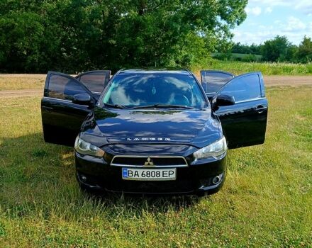 Чорний Міцубісі Lancer, об'ємом двигуна 1.8 л та пробігом 178 тис. км за 6500 $, фото 1 на Automoto.ua