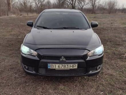 Чорний Міцубісі Lancer, об'ємом двигуна 2 л та пробігом 170 тис. км за 7850 $, фото 1 на Automoto.ua