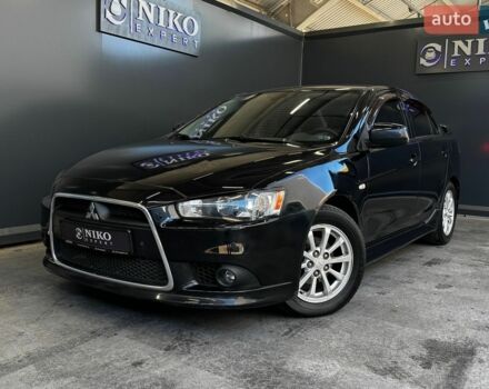 Чорний Міцубісі Lancer, об'ємом двигуна 2 л та пробігом 260 тис. км за 5800 $, фото 1 на Automoto.ua