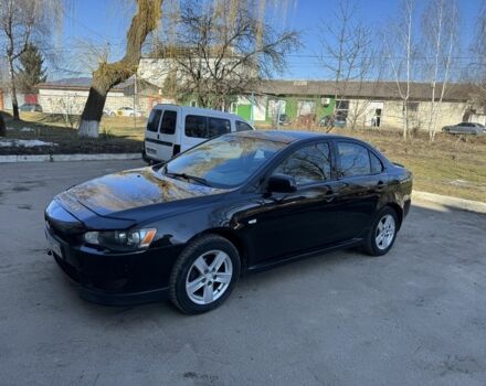 Черный Мицубиси Лансер, объемом двигателя 1.5 л и пробегом 312 тыс. км за 6500 $, фото 1 на Automoto.ua