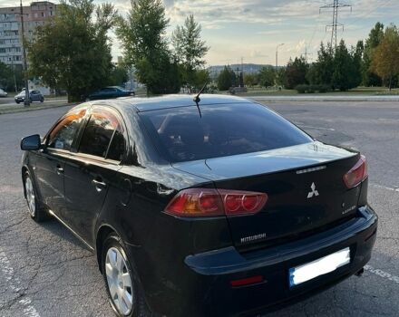 Чорний Міцубісі Lancer, об'ємом двигуна 1.5 л та пробігом 150 тис. км за 5499 $, фото 1 на Automoto.ua