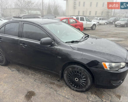 Черный Мицубиси Лансер, объемом двигателя 1.5 л и пробегом 173 тыс. км за 5600 $, фото 1 на Automoto.ua