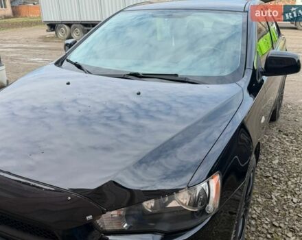 Черный Мицубиси Лансер, объемом двигателя 1.5 л и пробегом 159 тыс. км за 6200 $, фото 1 на Automoto.ua