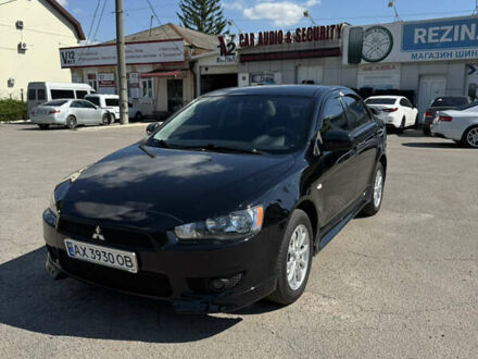 Черный Мицубиси Лансер, объемом двигателя 1.5 л и пробегом 230 тыс. км за 5400 $, фото 1 на Automoto.ua