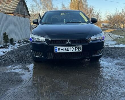 Черный Мицубиси Лансер, объемом двигателя 1.5 л и пробегом 216 тыс. км за 6500 $, фото 1 на Automoto.ua