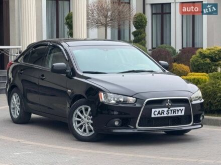 Чорний Міцубісі Lancer, об'ємом двигуна 1.8 л та пробігом 263 тис. км за 6999 $, фото 1 на Automoto.ua