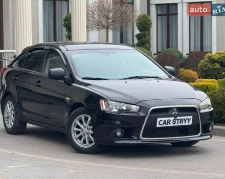 Чорний Міцубісі Lancer, об'ємом двигуна 1.8 л та пробігом 263 тис. км за 6999 $, фото 1 на Automoto.ua
