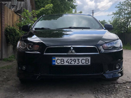 Чорний Міцубісі Lancer, об'ємом двигуна 2 л та пробігом 148 тис. км за 9200 $, фото 1 на Automoto.ua