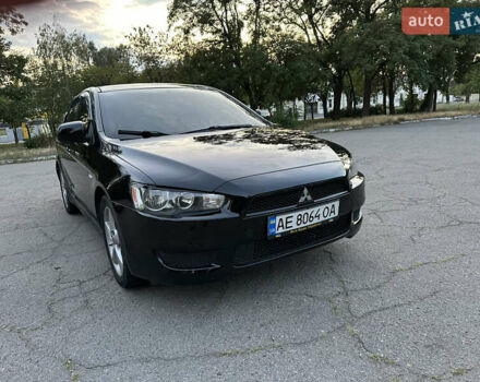 Чорний Міцубісі Lancer, об'ємом двигуна 1.58 л та пробігом 185 тис. км за 6999 $, фото 1 на Automoto.ua