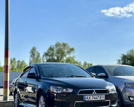 Черный Мицубиси Лансер, объемом двигателя 2 л и пробегом 93 тыс. км за 8800 $, фото 1 на Automoto.ua