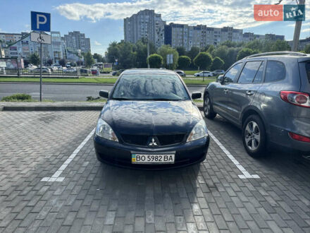 Міцубісі Lancer 2012 у Львові на Automoto.ua Чорний Міцубісі Lancer, об'ємом двигуна 1.58 л та пробігом 94 тис. км за 7500 $, фото 1 на Automoto.ua