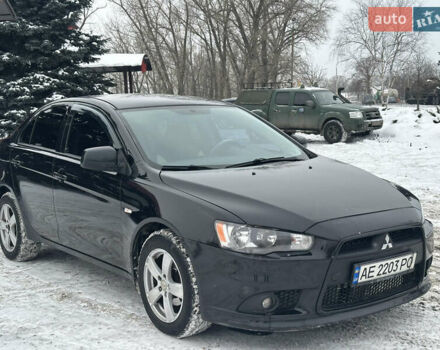 Чорний Міцубісі Lancer, об'ємом двигуна 1.59 л та пробігом 272 тис. км за 6500 $, фото 1 на Automoto.ua