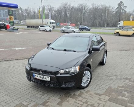 Черный Мицубиси Лансер, объемом двигателя 2 л и пробегом 223 тыс. км за 5500 $, фото 1 на Automoto.ua