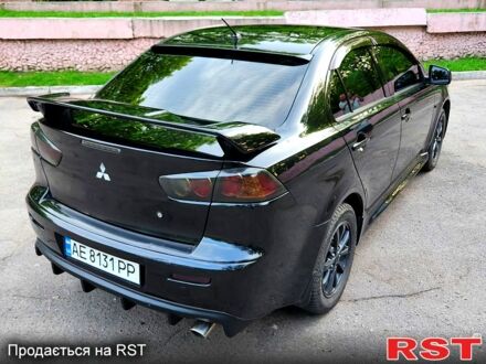 Чорний Міцубісі Lancer, об'ємом двигуна 1.6 л та пробігом 187 тис. км за 8399 $, фото 1 на Automoto.ua