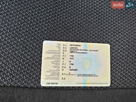 Черный Мицубиси Лансер, объемом двигателя 1.8 л и пробегом 143 тыс. км за 8300 $, фото 1 на Automoto.ua