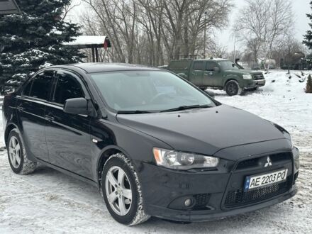 Черный Мицубиси Лансер, объемом двигателя 1.6 л и пробегом 272 тыс. км за 6500 $, фото 1 на Automoto.ua