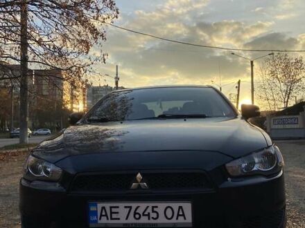 Черный Мицубиси Лансер, объемом двигателя 2 л и пробегом 175 тыс. км за 9200 $, фото 1 на Automoto.ua