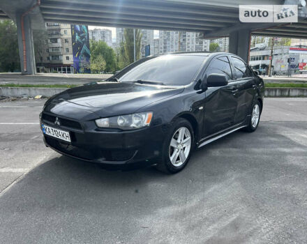 Чорний Міцубісі Lancer, об'ємом двигуна 2 л та пробігом 183 тис. км за 6500 $, фото 1 на Automoto.ua