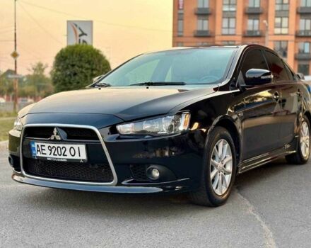 Чорний Міцубісі Lancer, об'ємом двигуна 2 л та пробігом 147 тис. км за 9500 $, фото 1 на Automoto.ua