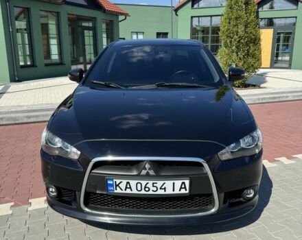 Черный Мицубиси Лансер, объемом двигателя 1.6 л и пробегом 130 тыс. км за 9964 $, фото 1 на Automoto.ua