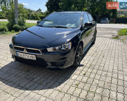 Чорний Міцубісі Lancer, об'ємом двигуна 2 л та пробігом 220 тис. км за 8500 $, фото 1 на Automoto.ua