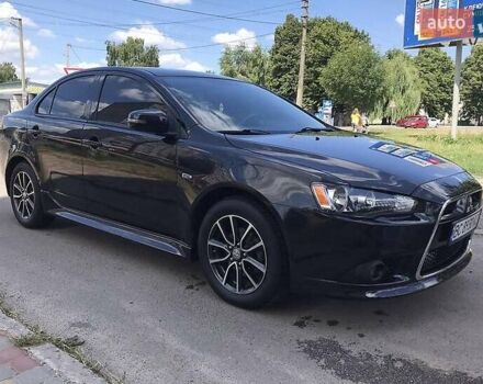 Черный Мицубиси Лансер, объемом двигателя 2.36 л и пробегом 169 тыс. км за 9000 $, фото 1 на Automoto.ua