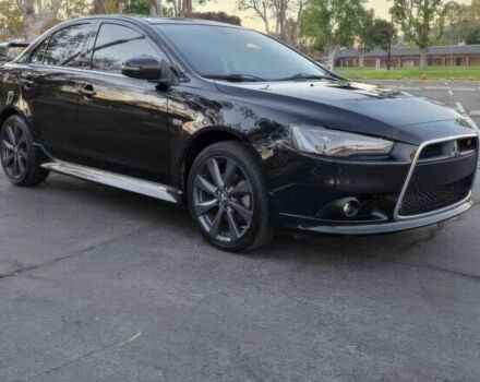 Черный Мицубиси Лансер, объемом двигателя 2 л и пробегом 73 тыс. км за 6500 $, фото 1 на Automoto.ua