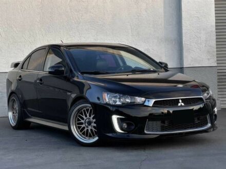 Черный Мицубиси Лансер, объемом двигателя 2.4 л и пробегом 76 тыс. км за 9200 $, фото 1 на Automoto.ua
