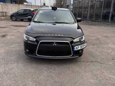 Черный Мицубиси Лансер, объемом двигателя 2 л и пробегом 156 тыс. км за 8999 $, фото 1 на Automoto.ua