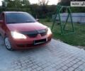 Гранатовий Міцубісі Lancer, об'ємом двигуна 0 л та пробігом 130 тис. км за 7300 $, фото 1 на Automoto.ua