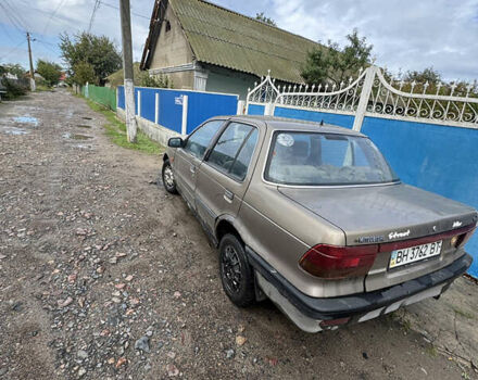 Коричневый Мицубиси Лансер, объемом двигателя 1.5 л и пробегом 320 тыс. км за 700 $, фото 3 на Automoto.ua