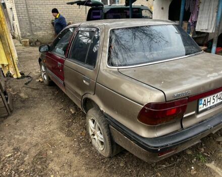 Коричневий Міцубісі Lancer, об'ємом двигуна 1.8 л та пробігом 200 тис. км за 1136 $, фото 3 на Automoto.ua