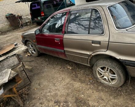 Коричневий Міцубісі Lancer, об'ємом двигуна 1.8 л та пробігом 200 тис. км за 1136 $, фото 4 на Automoto.ua