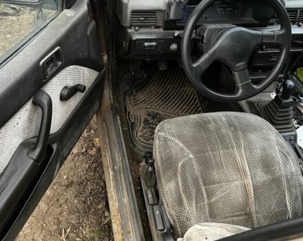 Коричневий Міцубісі Lancer, об'ємом двигуна 1.8 л та пробігом 200 тис. км за 1136 $, фото 6 на Automoto.ua