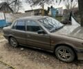 Коричневий Міцубісі Lancer, об'ємом двигуна 1.8 л та пробігом 200 тис. км за 1136 $, фото 1 на Automoto.ua