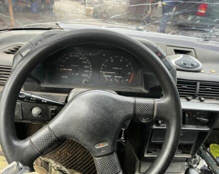 Коричневий Міцубісі Lancer, об'ємом двигуна 1.8 л та пробігом 200 тис. км за 1136 $, фото 5 на Automoto.ua