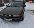 Коричневый Мицубиси Лансер, объемом двигателя 1.47 л и пробегом 350 тыс. км за 850 $, фото 1 на Automoto.ua