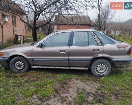 Коричневий Міцубісі Lancer, об'ємом двигуна 1.5 л та пробігом 200 тис. км за 700 $, фото 9 на Automoto.ua