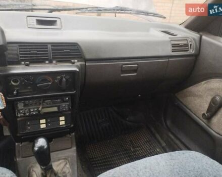 Коричневий Міцубісі Lancer, об'ємом двигуна 1.5 л та пробігом 200 тис. км за 700 $, фото 3 на Automoto.ua