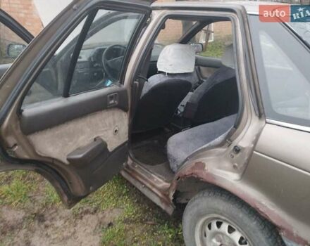 Коричневий Міцубісі Lancer, об'ємом двигуна 1.5 л та пробігом 200 тис. км за 700 $, фото 1 на Automoto.ua