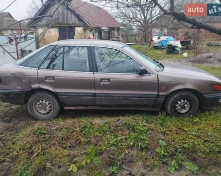 Коричневий Міцубісі Lancer, об'ємом двигуна 1.5 л та пробігом 200 тис. км за 700 $, фото 7 на Automoto.ua