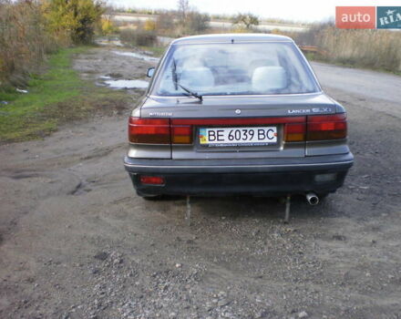 Коричневый Мицубиси Лансер, объемом двигателя 1.5 л и пробегом 220 тыс. км за 1800 $, фото 2 на Automoto.ua