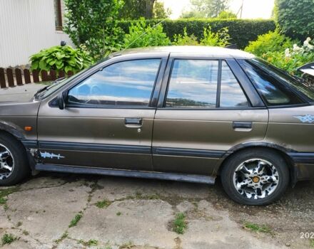 Коричневий Міцубісі Lancer, об'ємом двигуна 1.5 л та пробігом 608 тис. км за 900 $, фото 1 на Automoto.ua