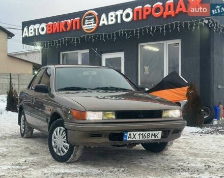 Коричневий Міцубісі Lancer, об'ємом двигуна 1.47 л та пробігом 256 тис. км за 2200 $, фото 1 на Automoto.ua
